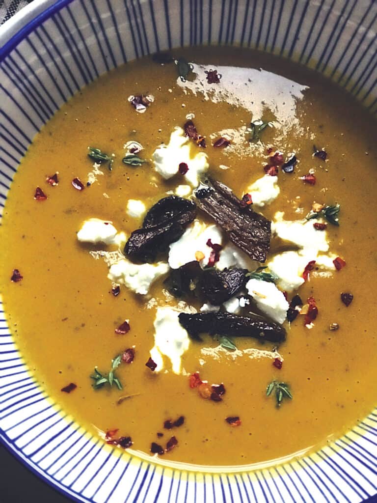 A bowl of red kabocha soup.