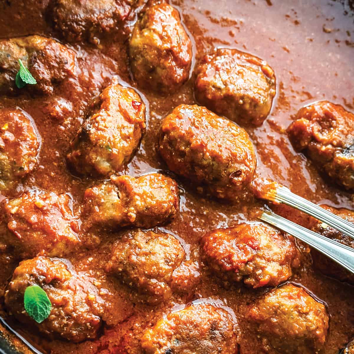 Soutzoukakia-Smyrna Meatballs In Red Sauce