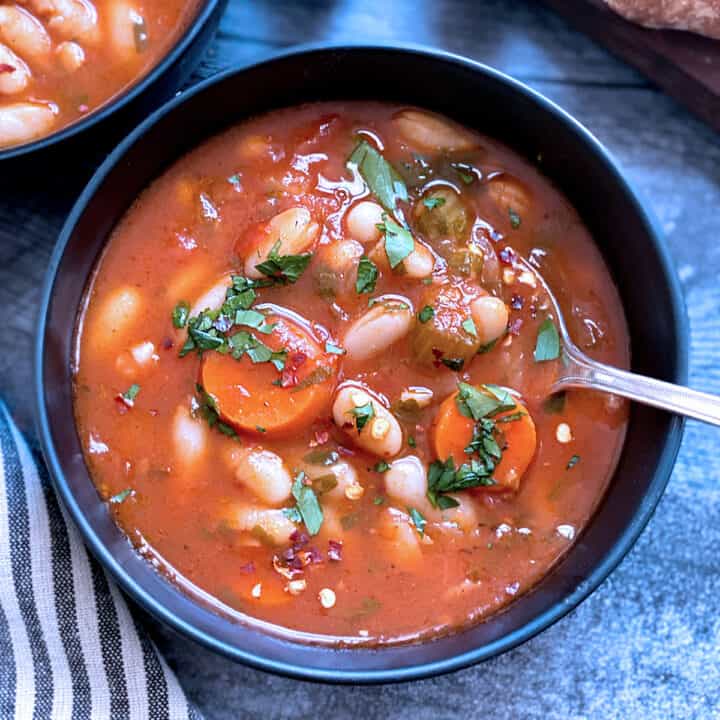 A bowl with fasolada-greek white bean soup.