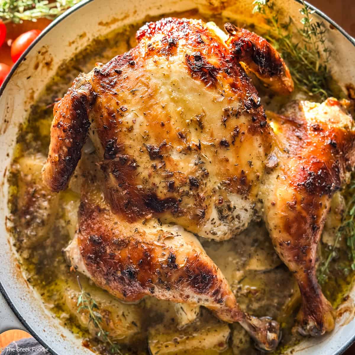 A Greek spatchcock chicken and potatoes, in a lemon and herbs sauce