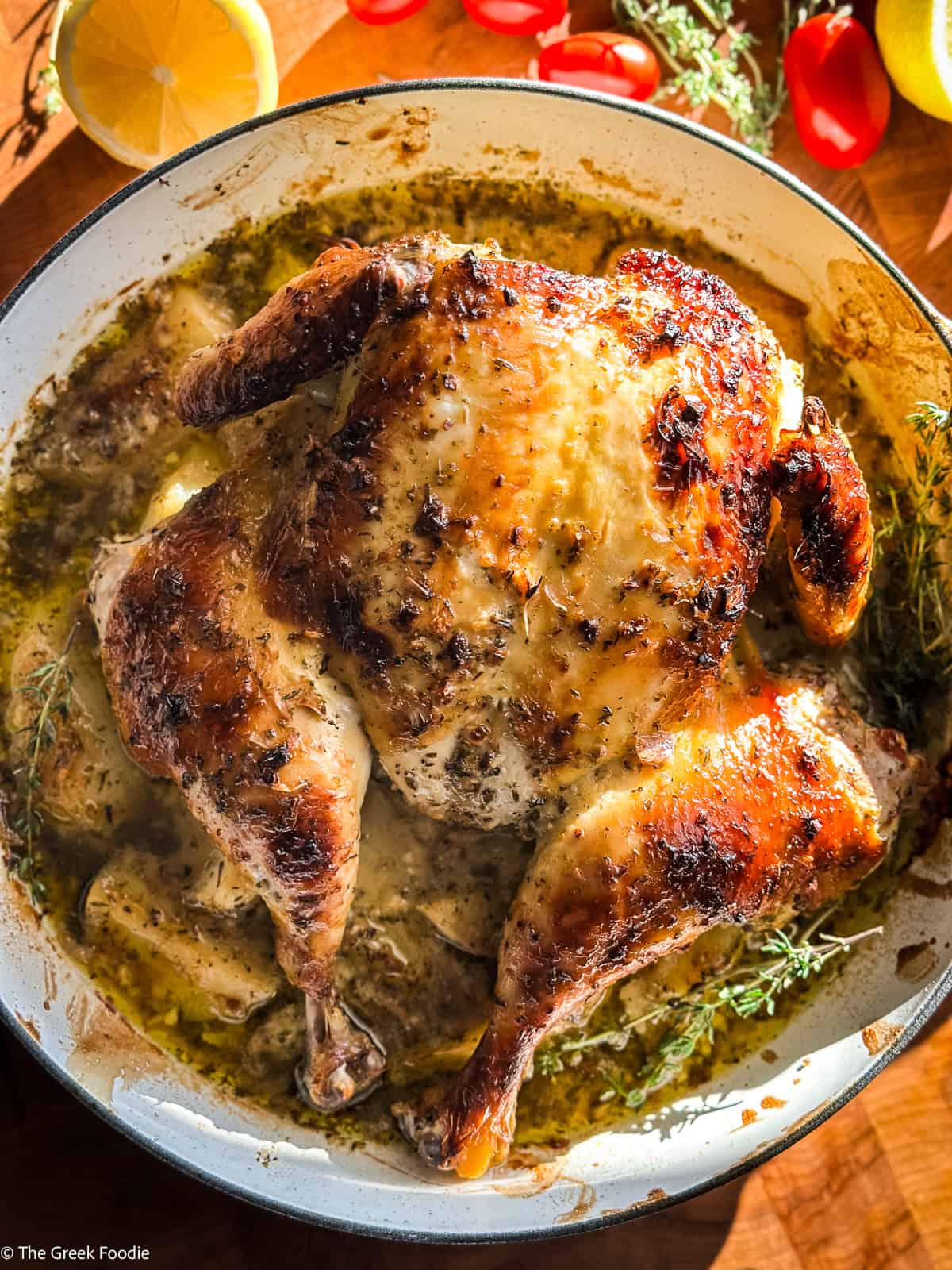 A Greek spatchcock chicken with potatoes, lemon and herbs