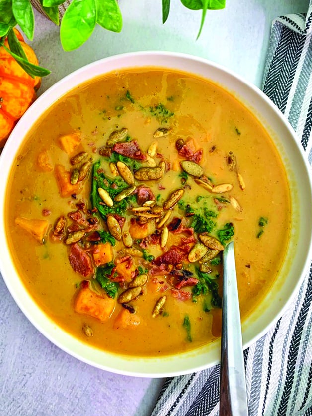 A bowl with sweet potato chowder soup.