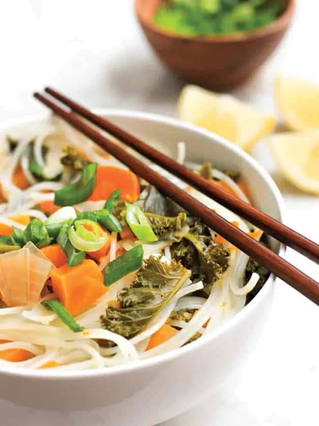 A bowl with vegetable noodle soup.