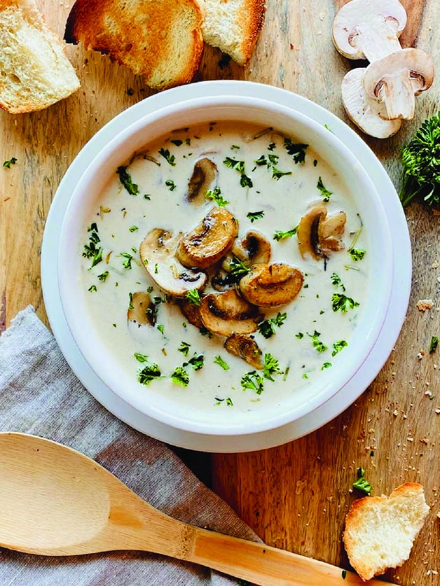 A bowl with mushroom soup.