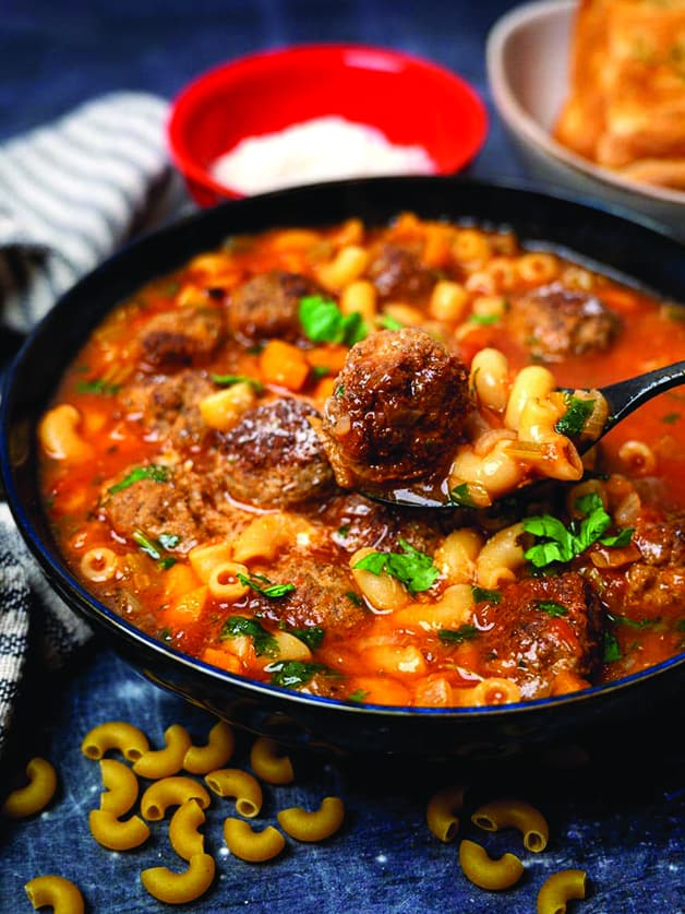 A bowl with Italian meatball soup.