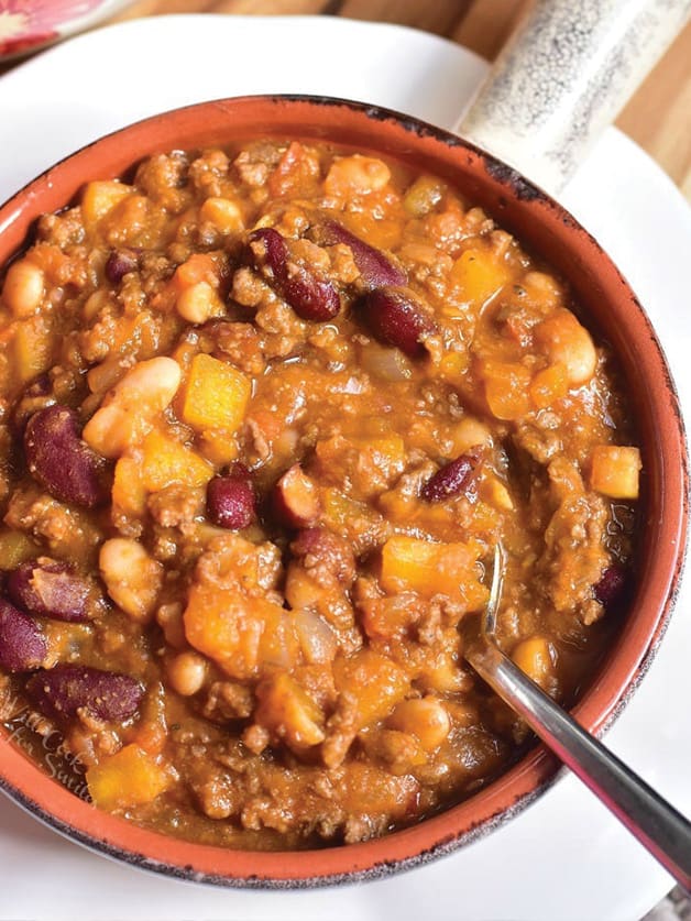 A bowl with pumpkin chili.