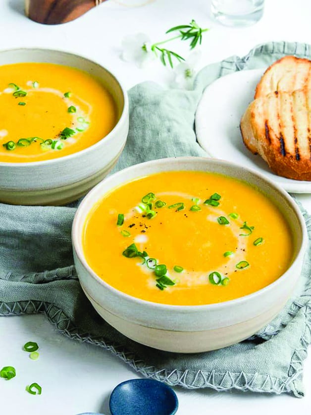 A bowl with carrot soup.