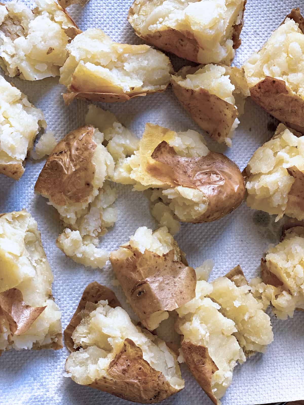 Potato pieces on paper towels.