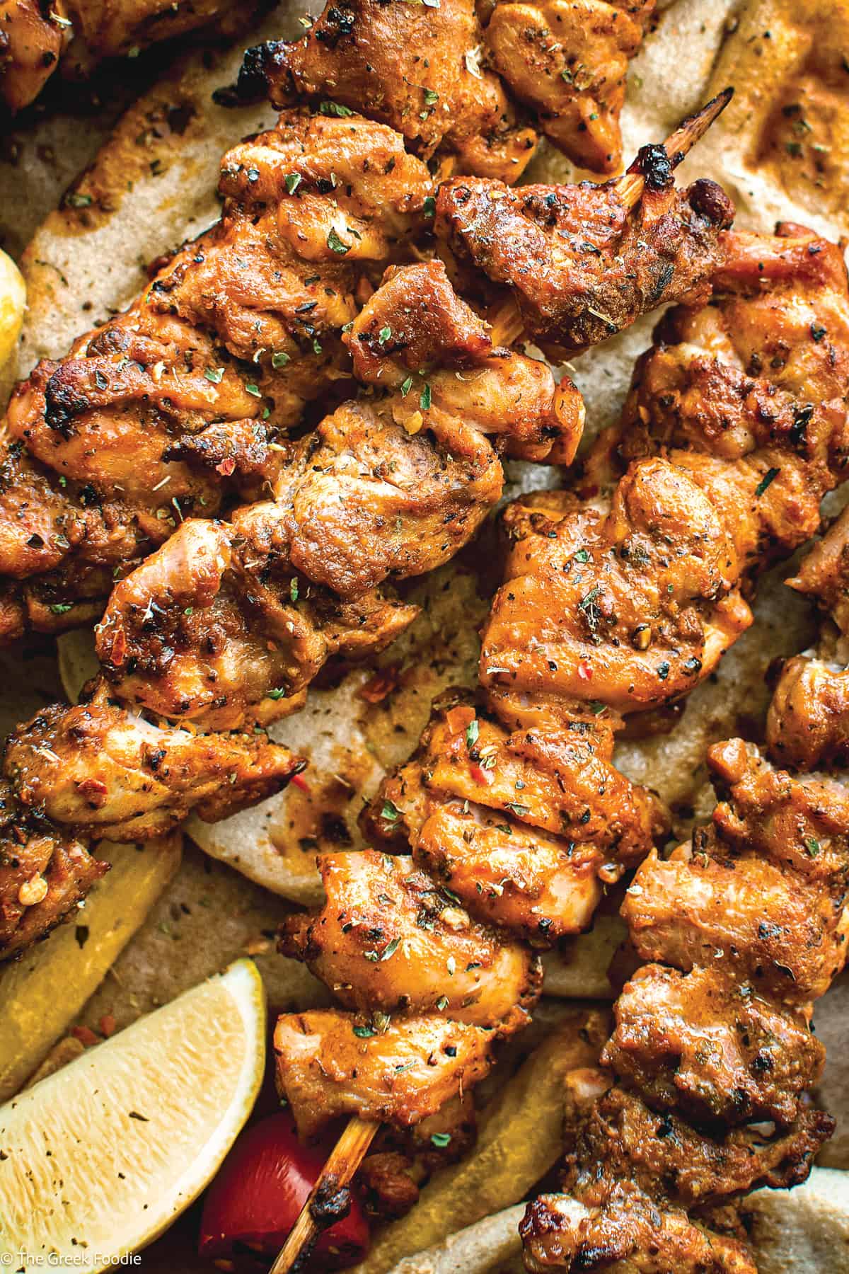 Chicken souvlaki Kalamaki skewers with pita and fries