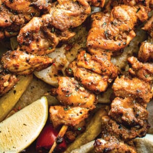 Chicken souvlaki Kalamaki skewers with pita and fries