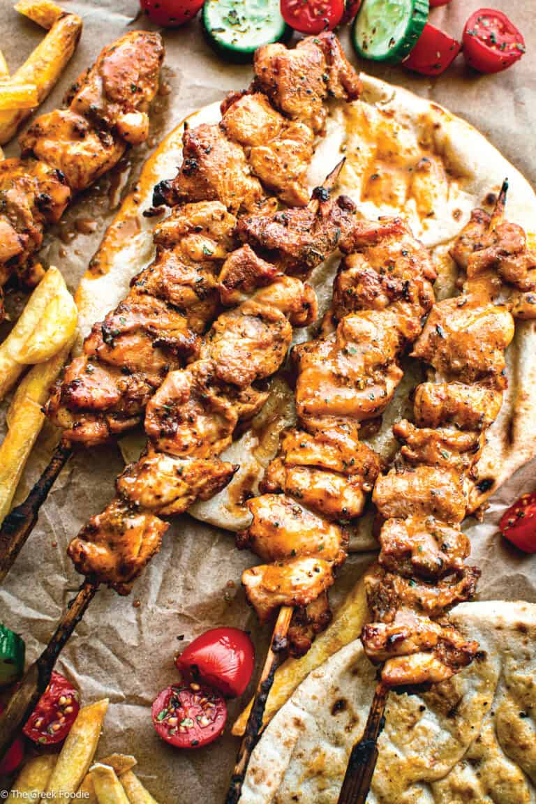 Greek chicken souvlaki Kalamaki skewers with pita and fries