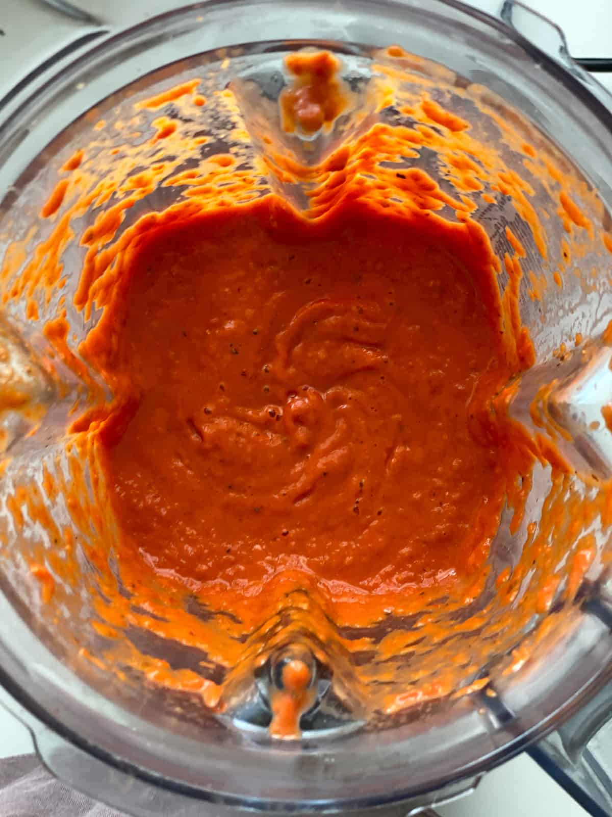 Creamy tomato sauce in a blender.