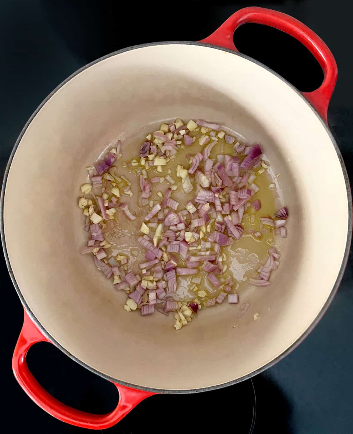 Diced onion with olive oil in a stockpot.