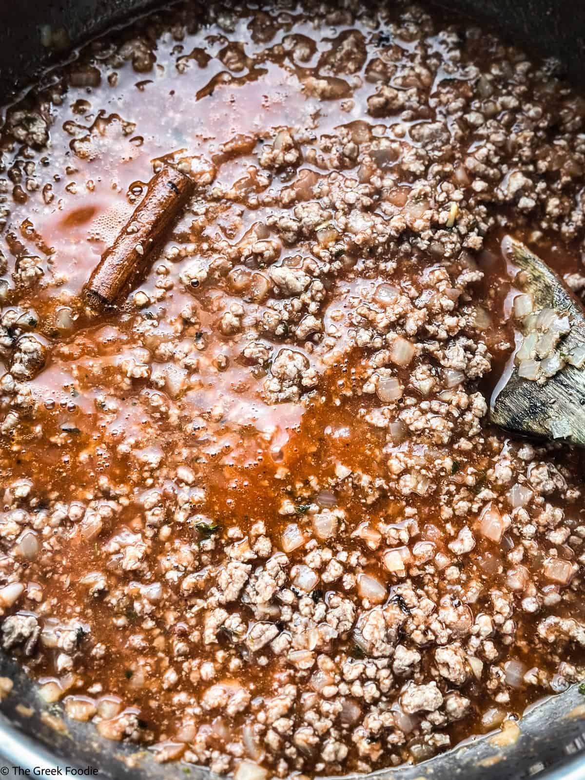 Meat ragu sauce cooking for authentic Greek moussaka