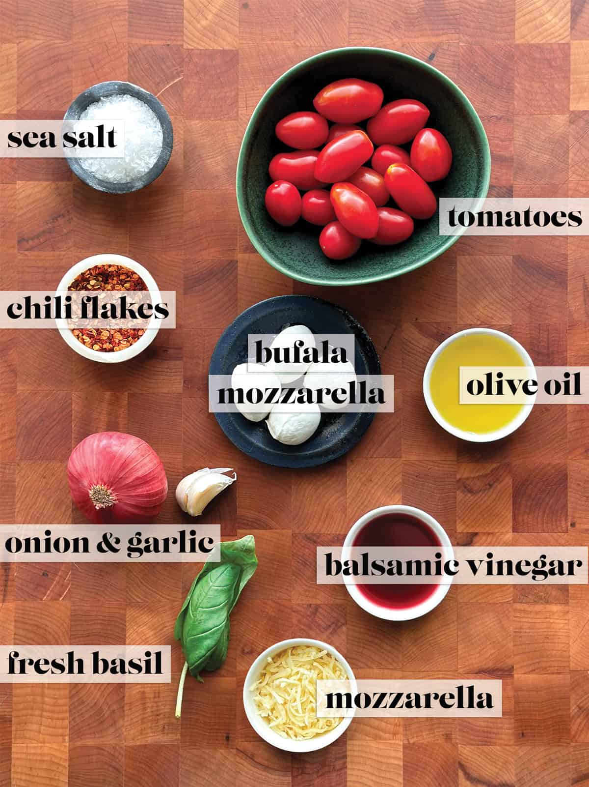 Ingredients for making buffalo mozzarella pita pizza.