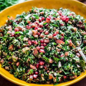 Tabouli Salad-Tabbouleh in a yellow bowl on a table.