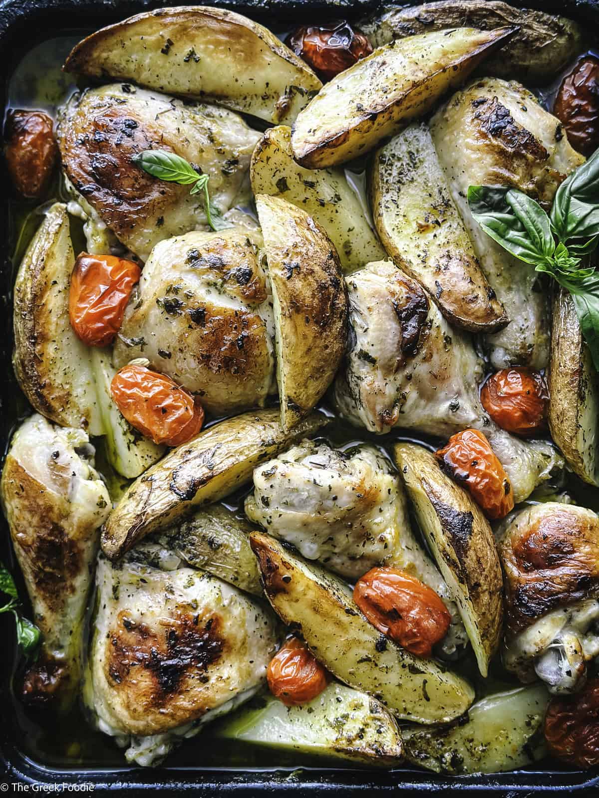 A Greek Sheet Pan Chicken with herbs.