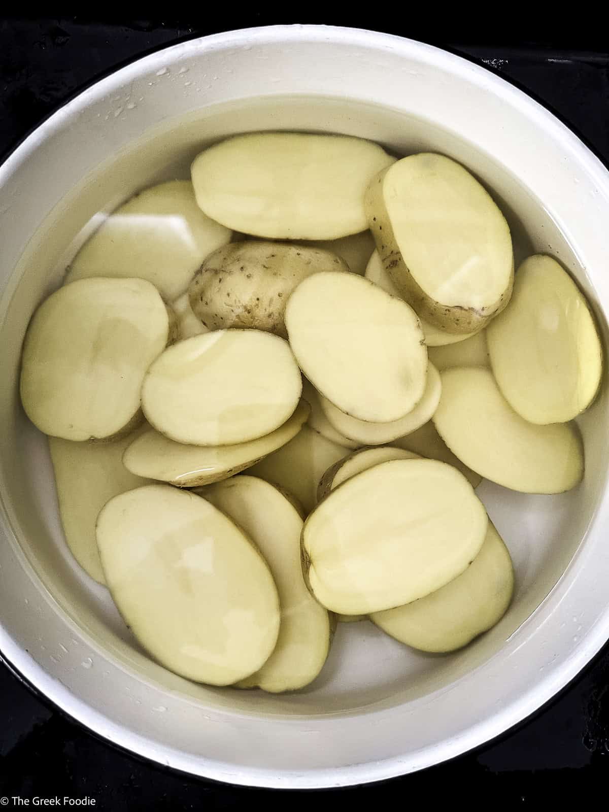 Potato slices in water.