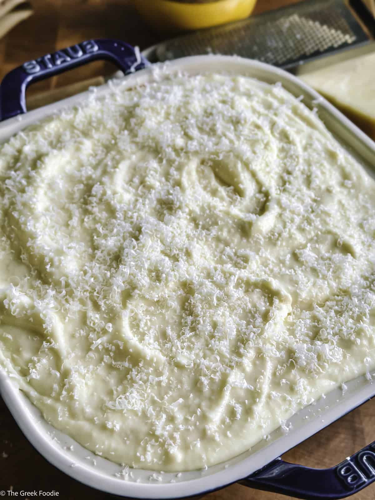 A uncooked vegetarian moussaka on a working surface.