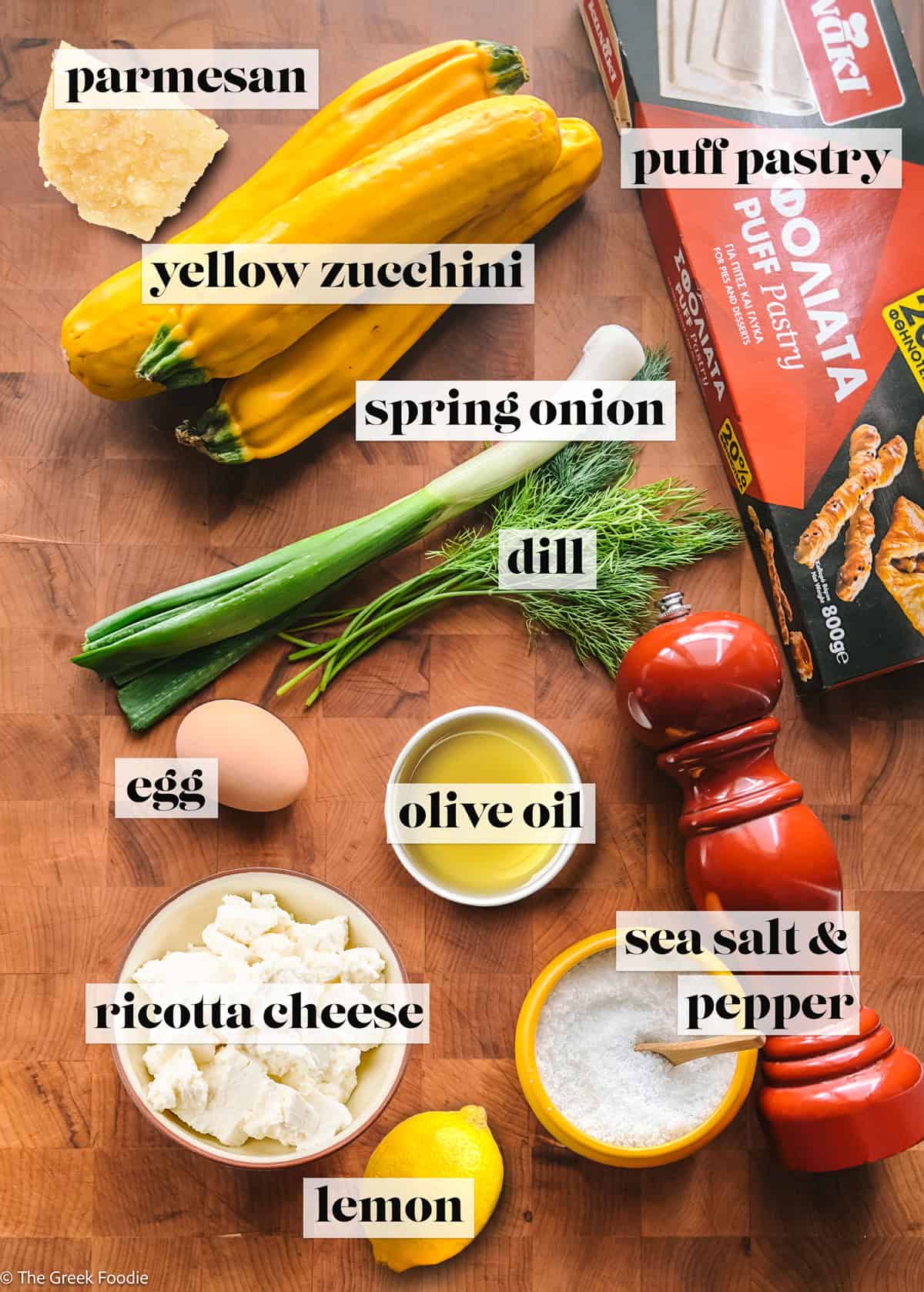Ingredients for a zucchini puff pastry tart.