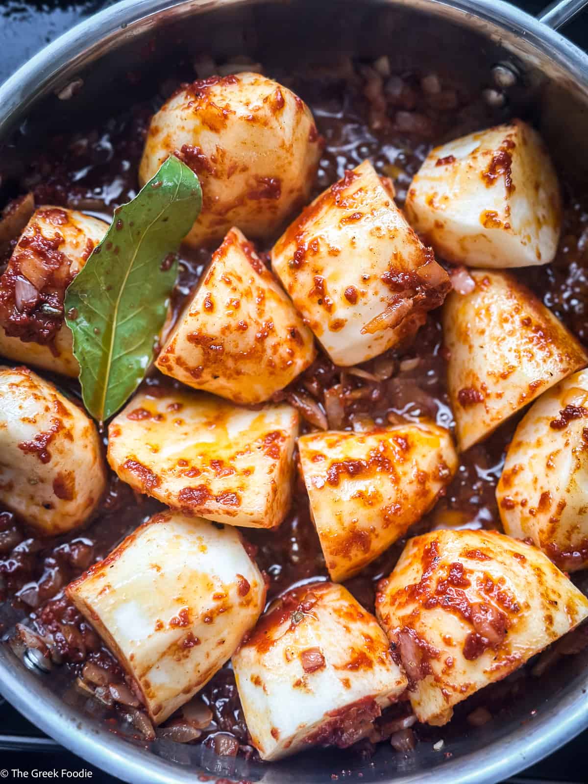 Onions, tomato paste and two bay leaves.