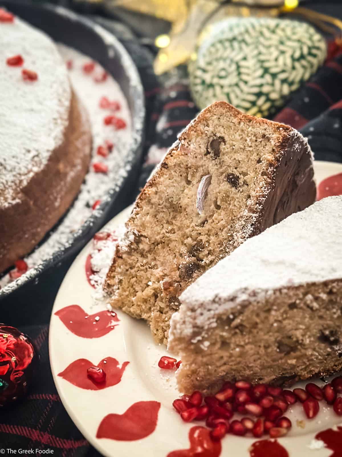 Two pieces of Vasilopita- Greek New Years Eve cake.