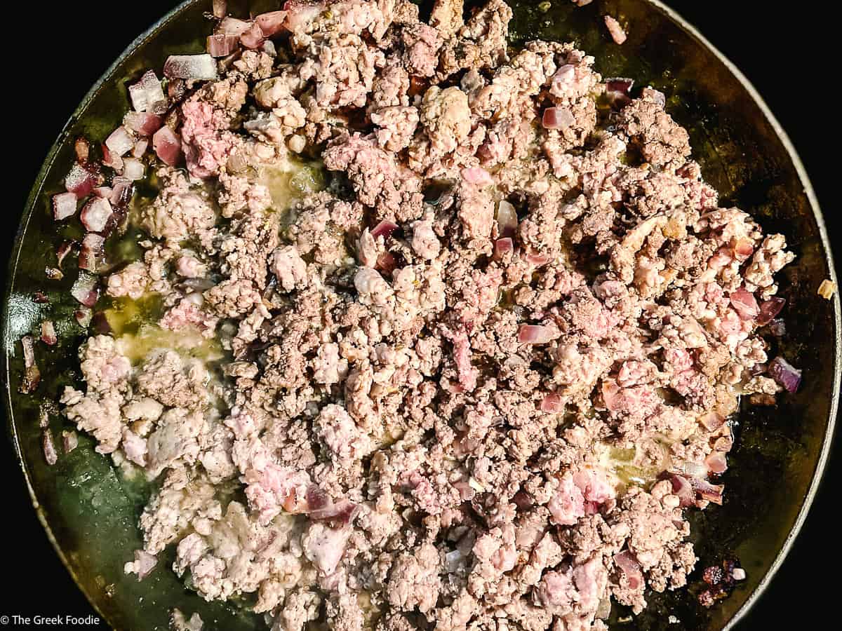 Greek turkey stuffing cooking on the stove.