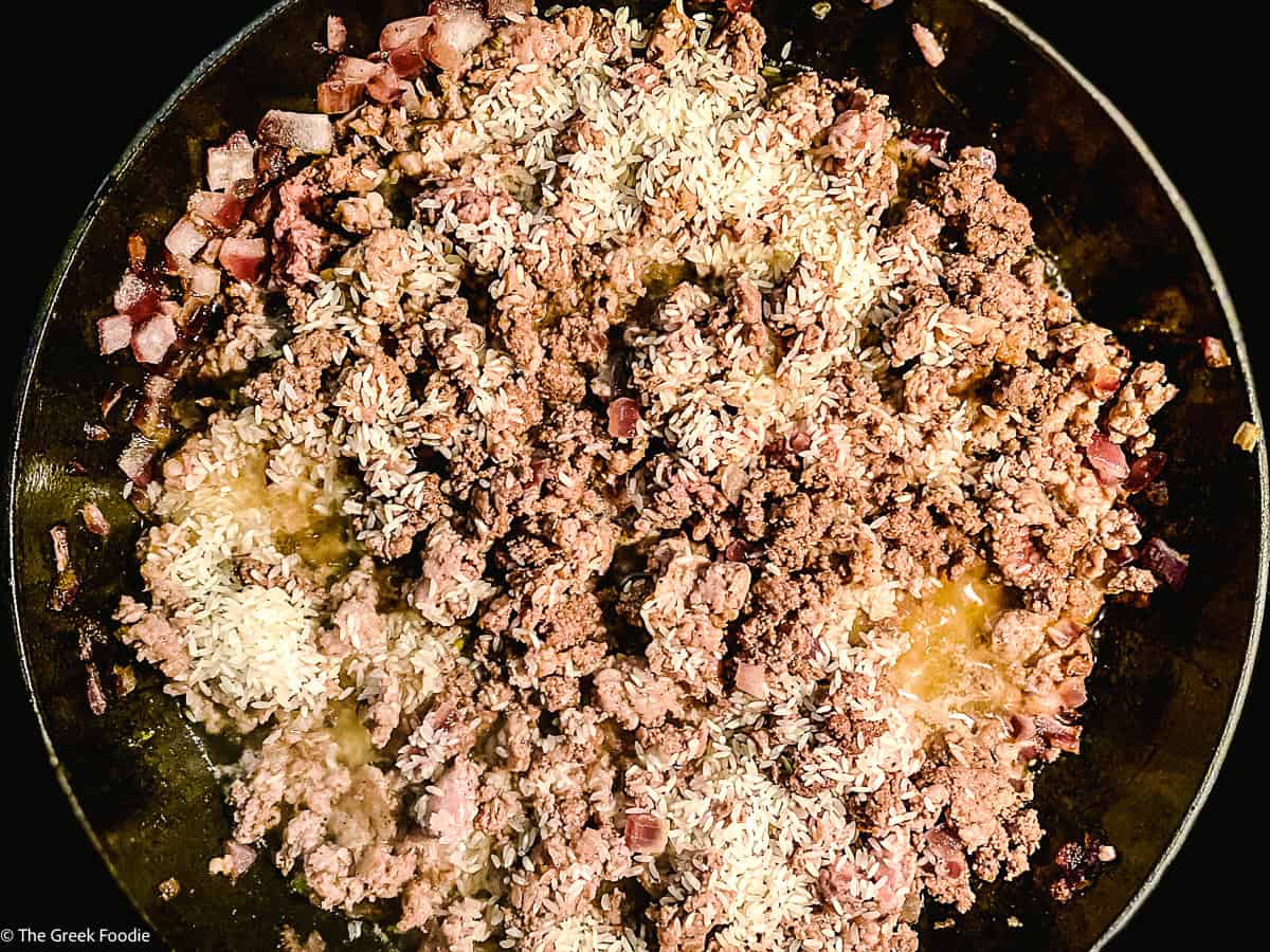 Greek turkey stuffing cooking on the stove.