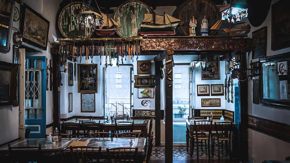 The rustic interior of a very old traditional Greek taverna.