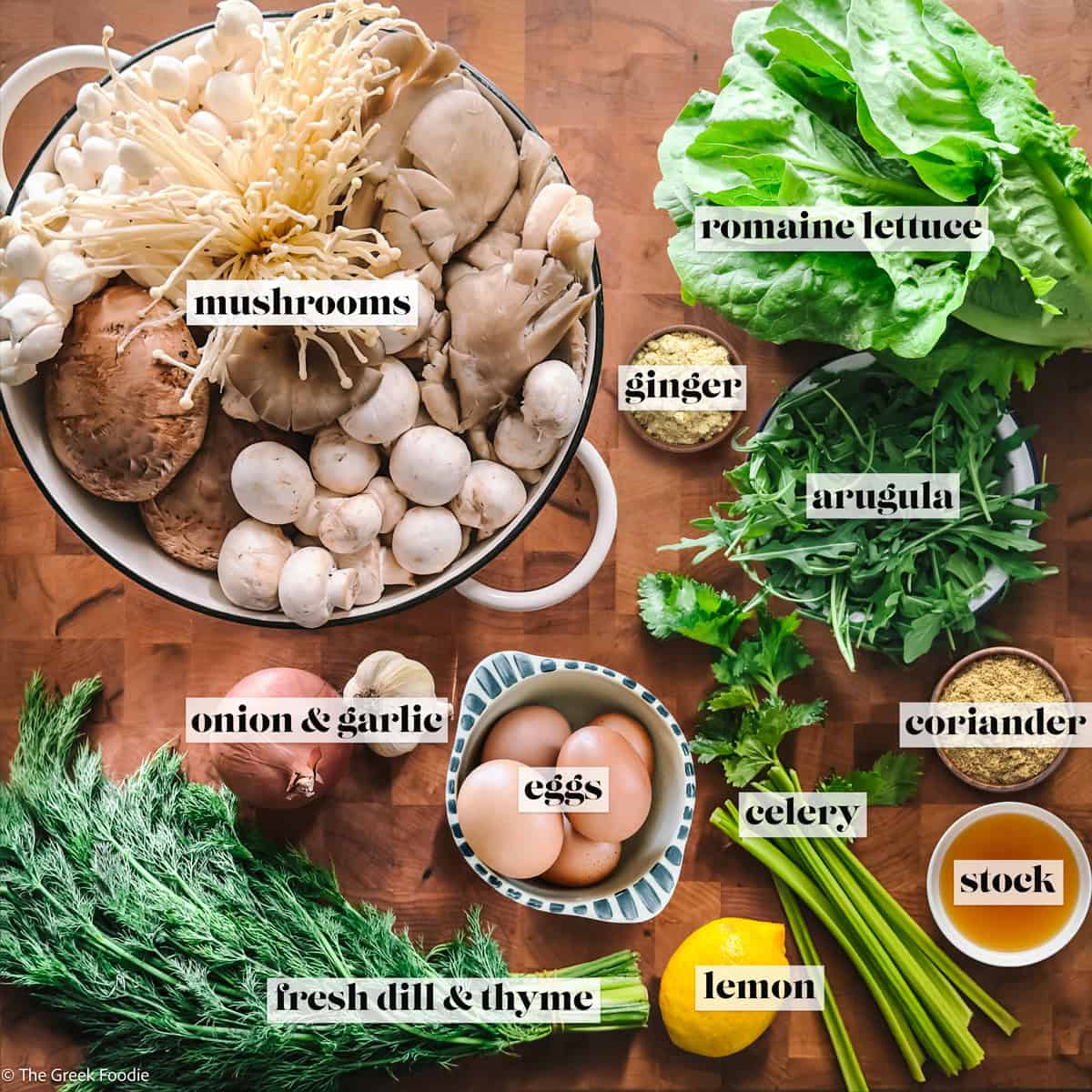 Mixed mushrooms, greens, herbs, eggs and lemon for vegetarian Greek Easter soup magiritsa