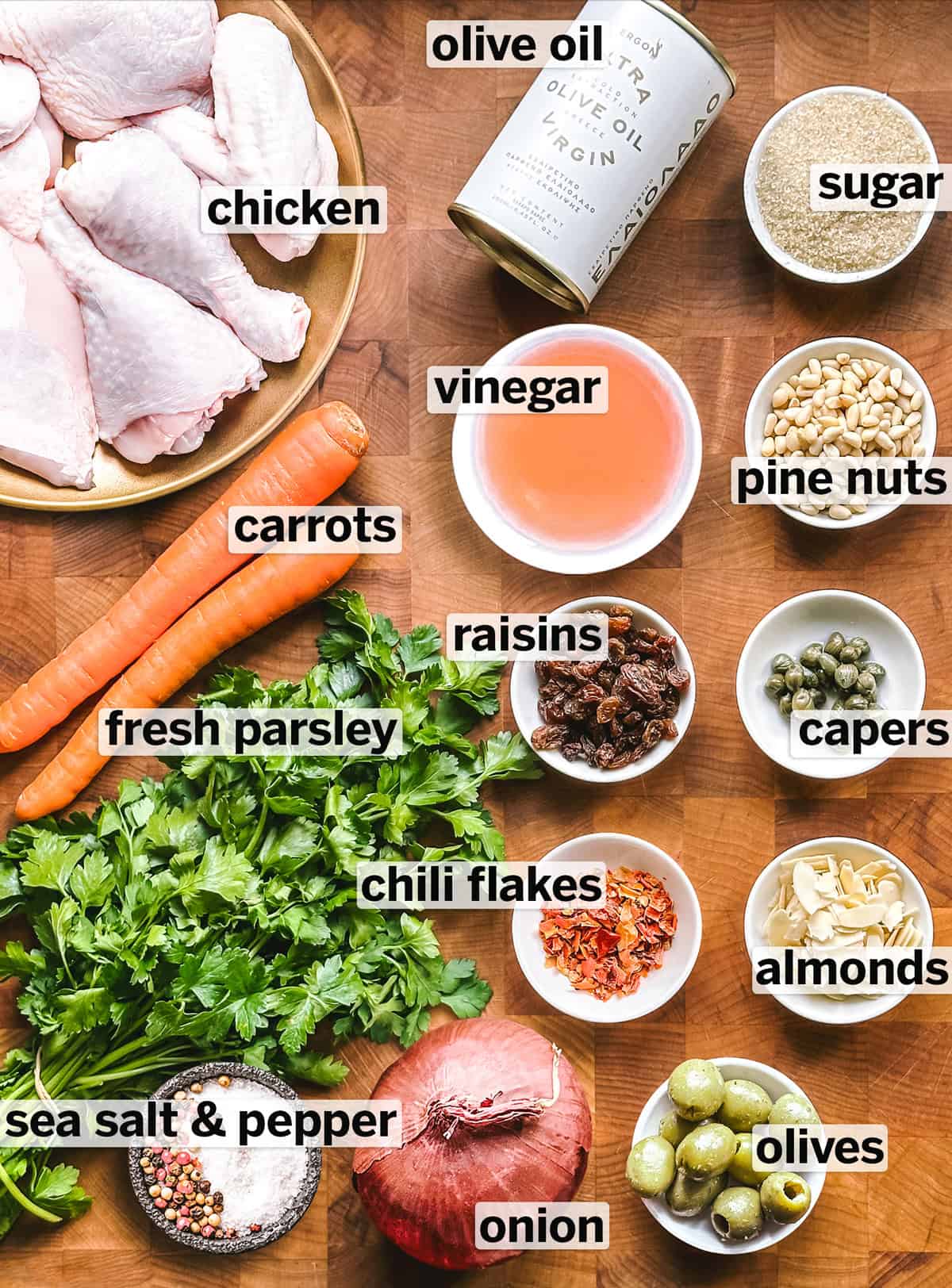 Ingredients gathered for making Sicilian chicken with red wine reduction.
