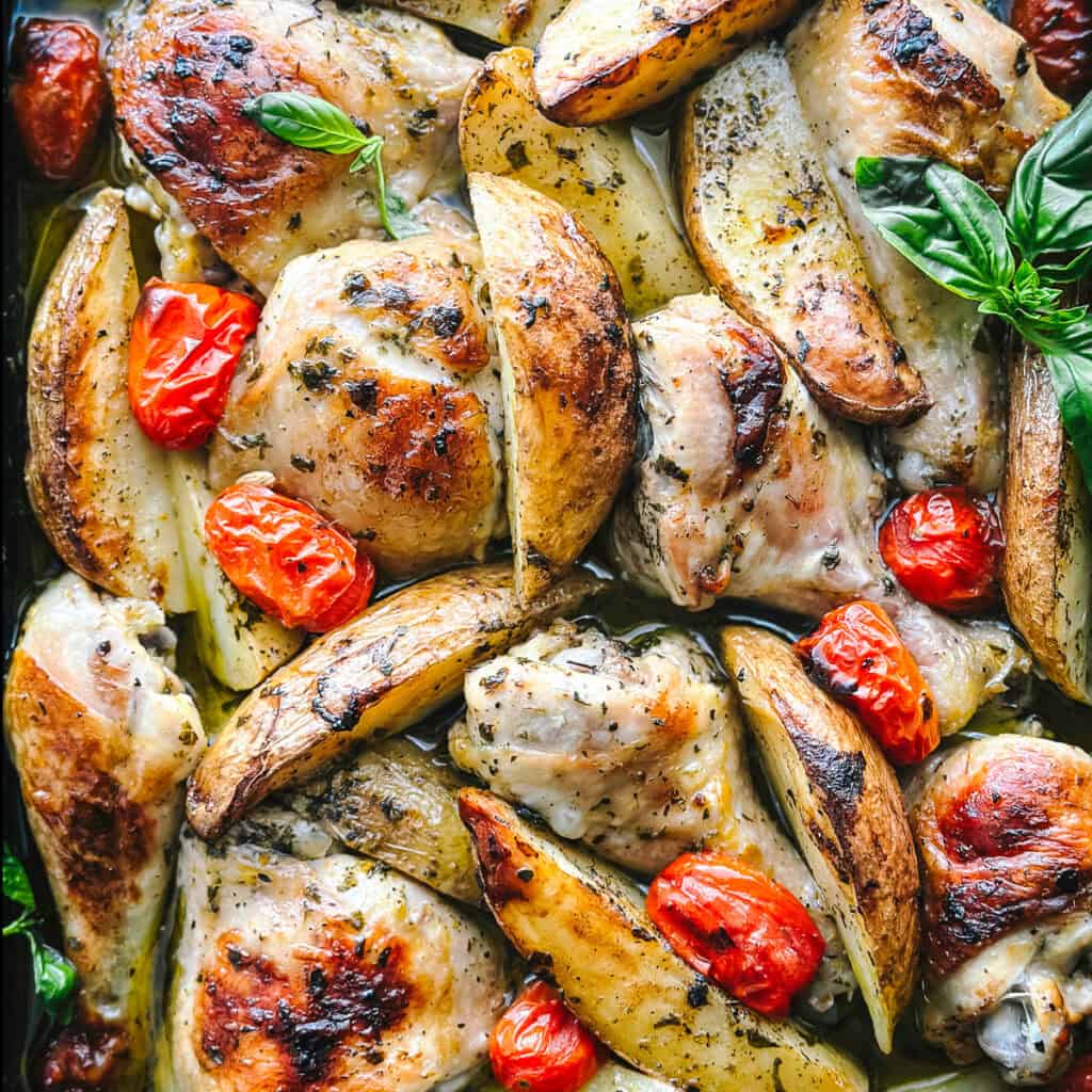 Chicken and potatoes cooked in one pan with orange and lemon marinade