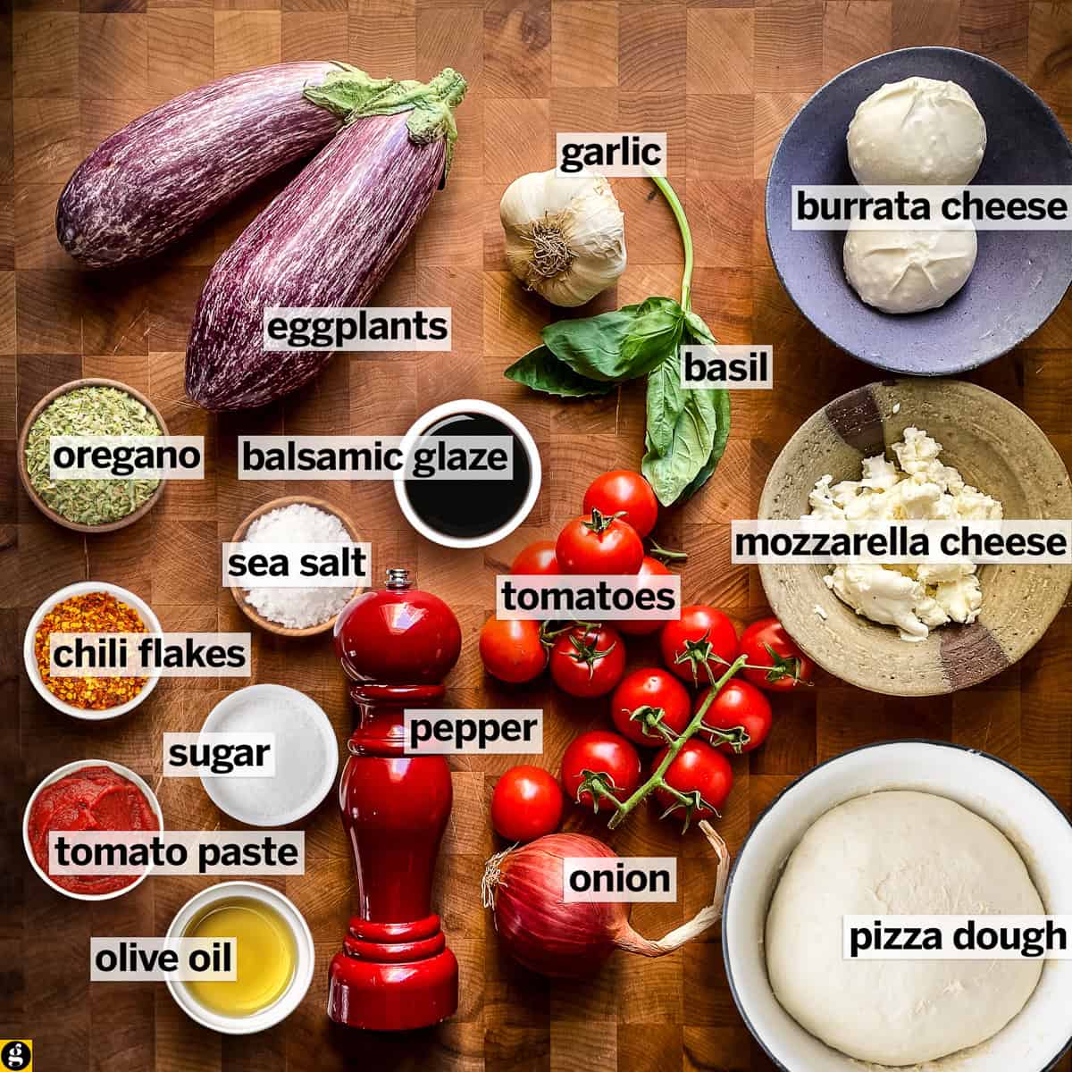 Ingredients for burrata pizza with eggplant: eggplants, pizza dough, burrata, fresh mozzarella, cherry tomatoes, red onion, garlic, basil, tomato paste, olive oil, balsamic glaze, oregano, chili flakes, sugar, sea salt, and pepper.