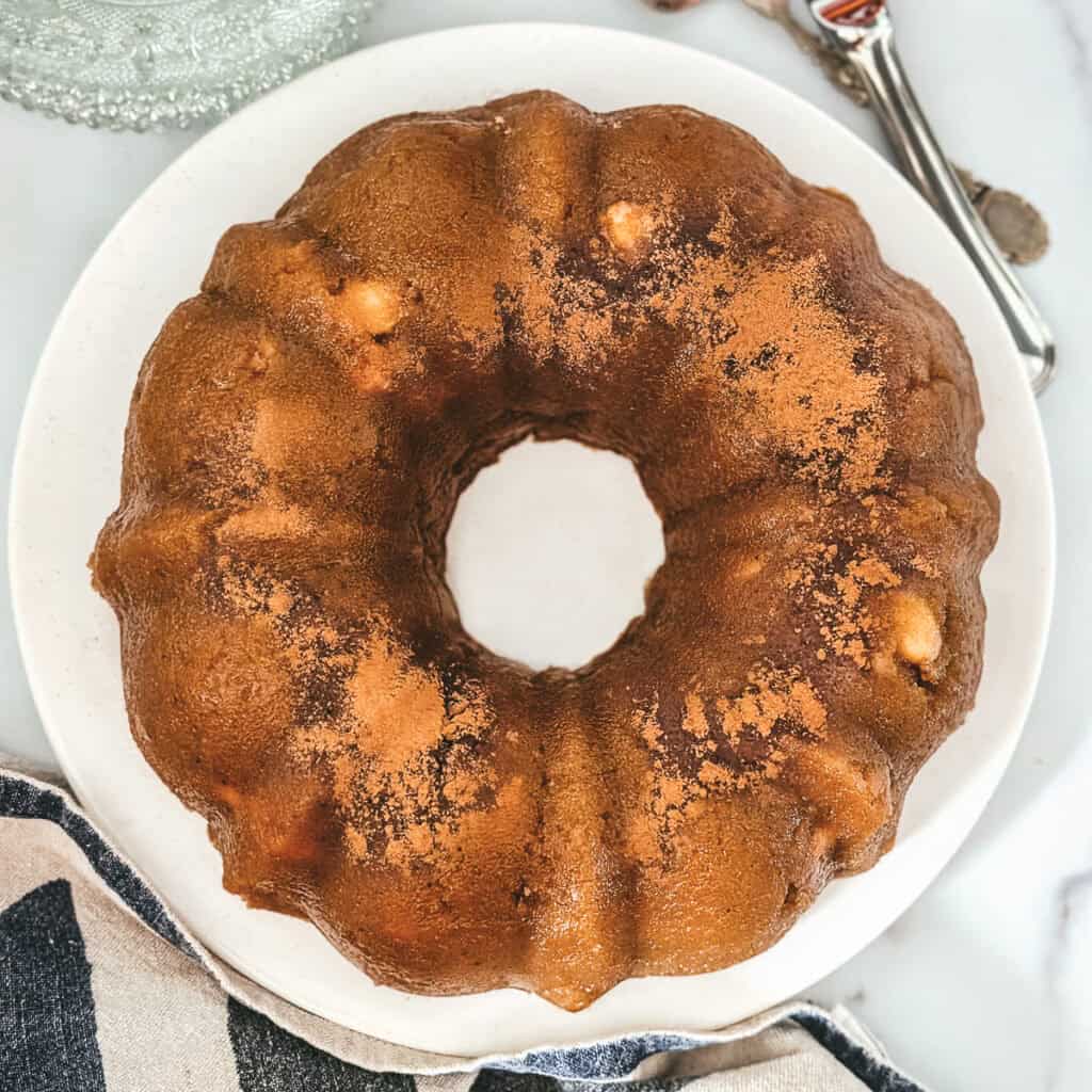 Greek semolina halva with toasted almonds, dusted with cinnamon